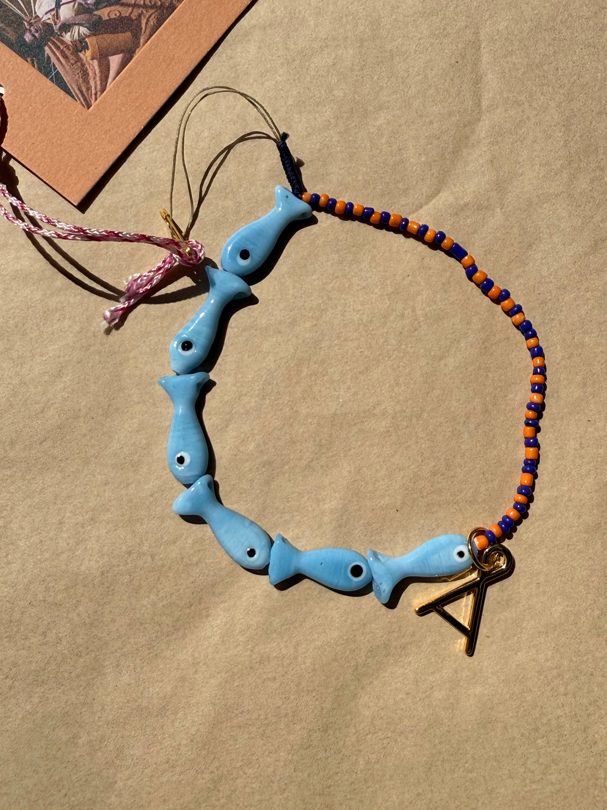 Among Equals Lucky fish adornment