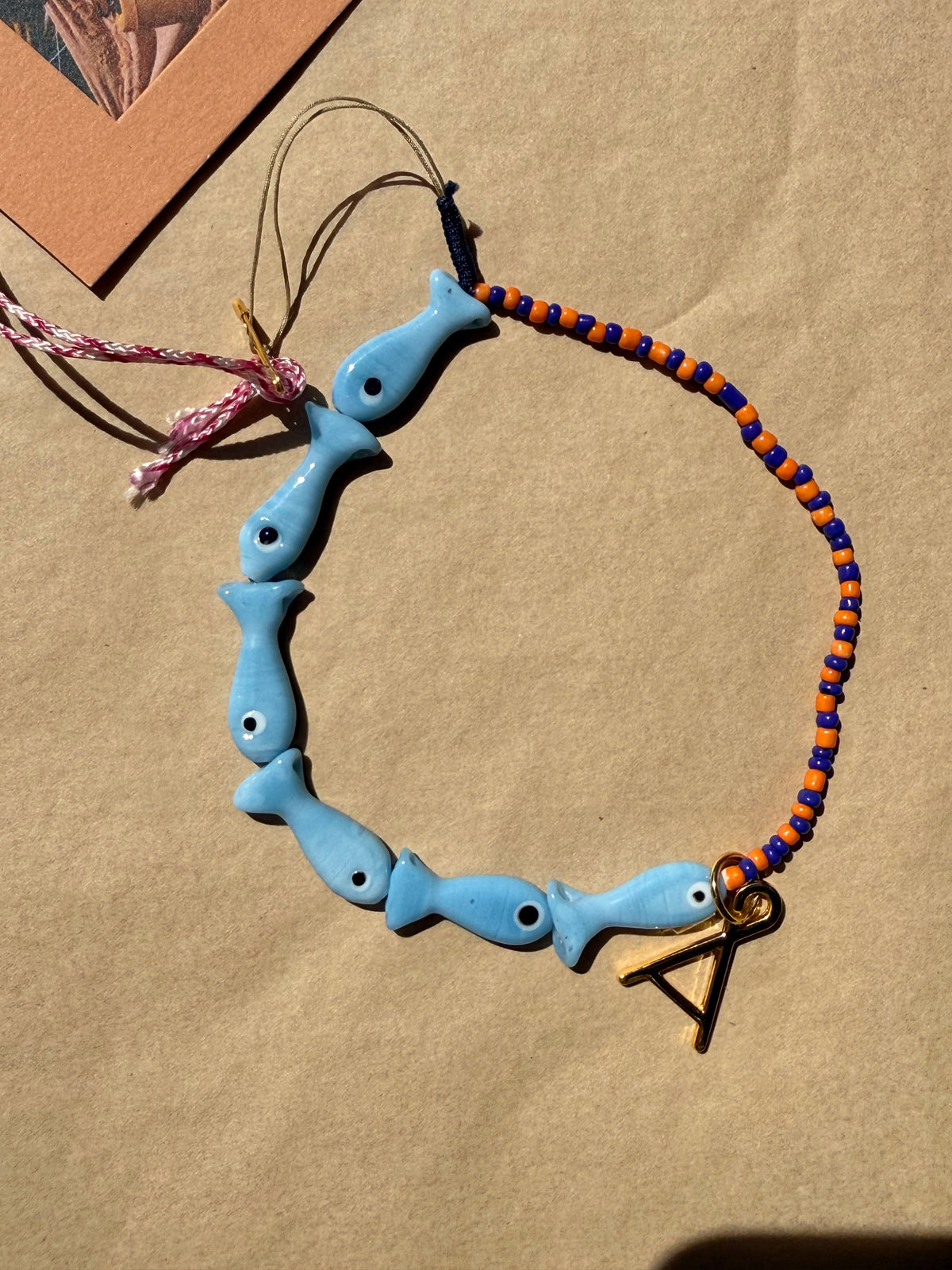 Among Equals Lucky fish adornment