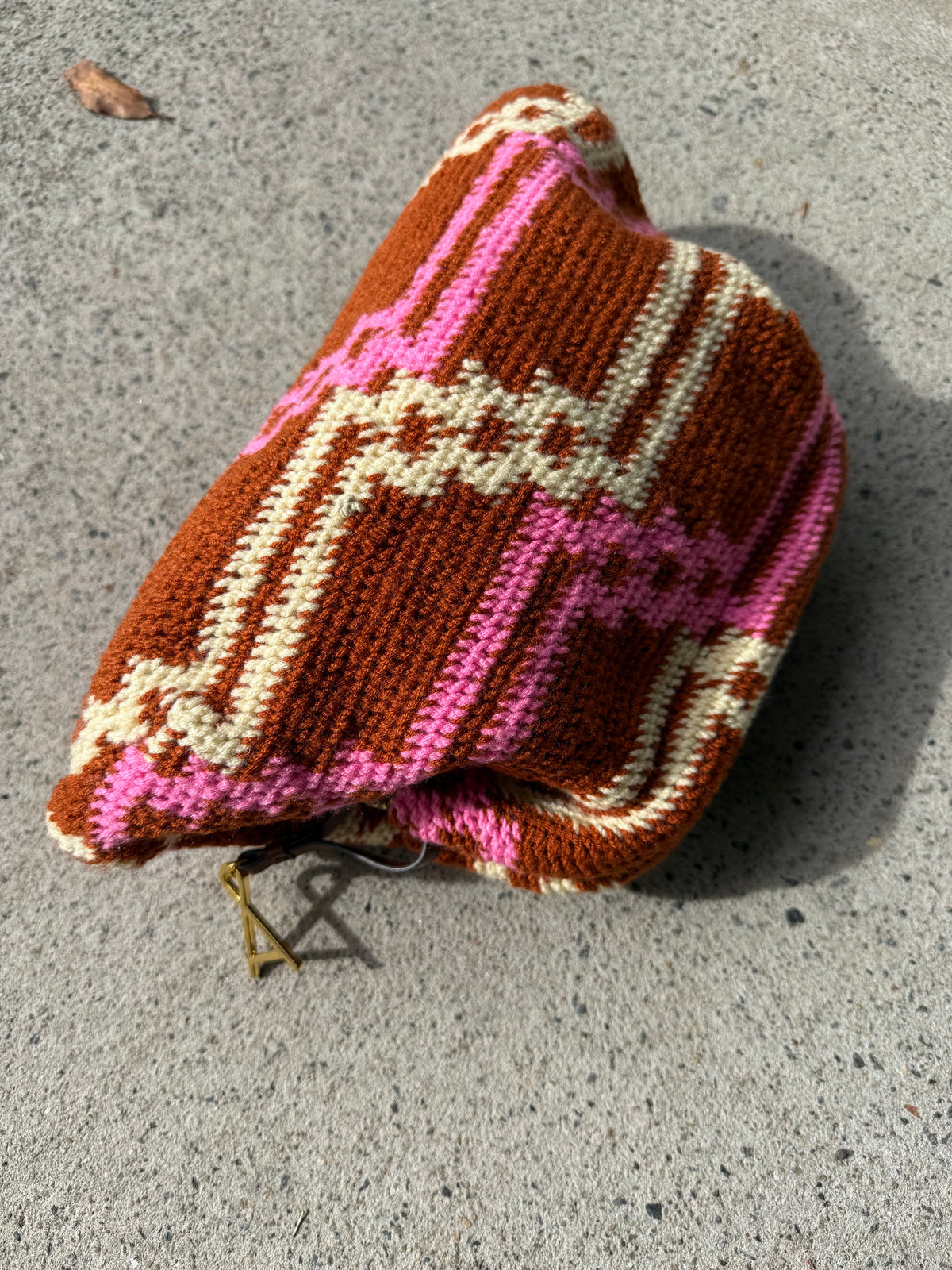 Among Equals Pink, Tobacco and cream Bilum clutch