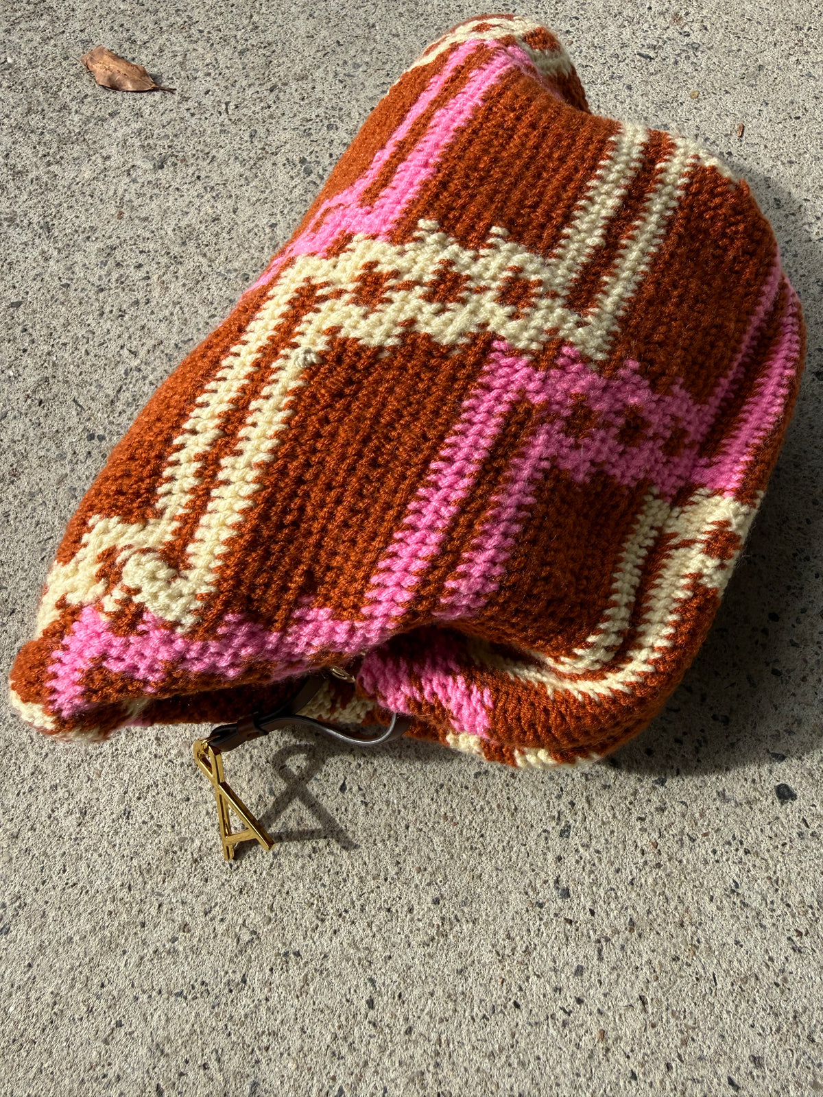 Among Equals Pink, Tobacco and cream Bilum clutch