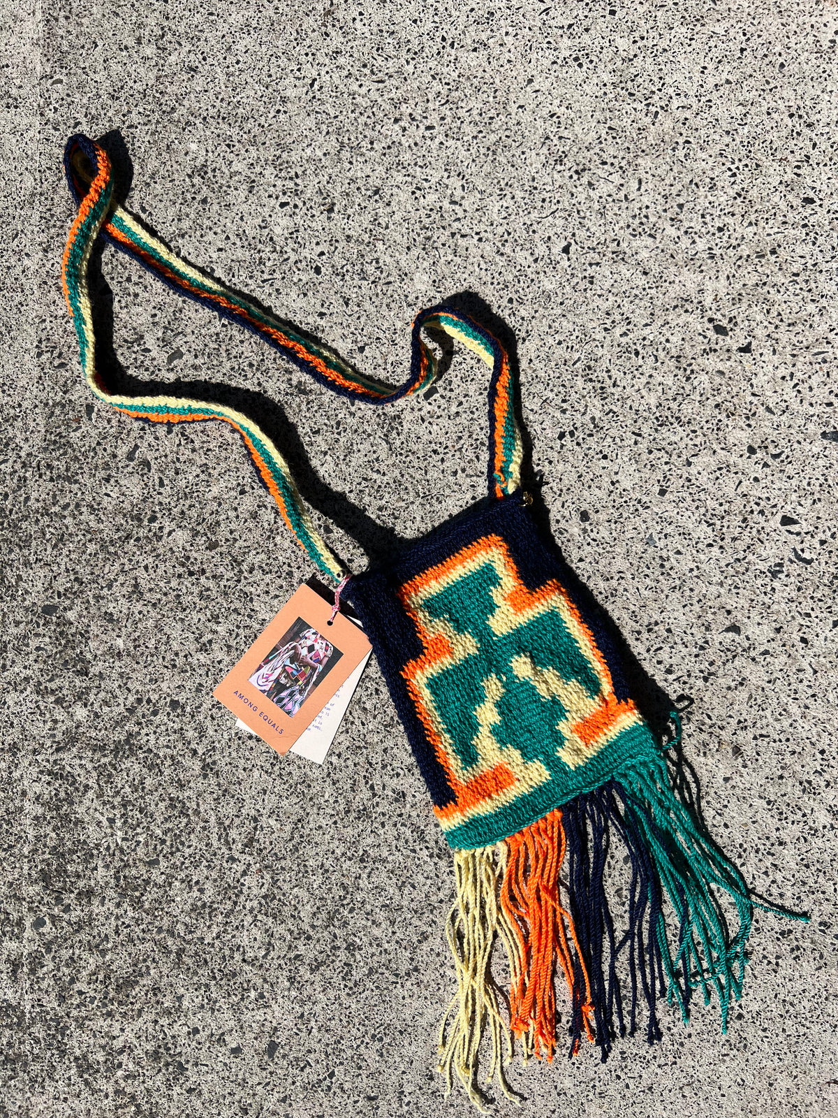 Among Equals Kandu Design Mini cross body with tassel