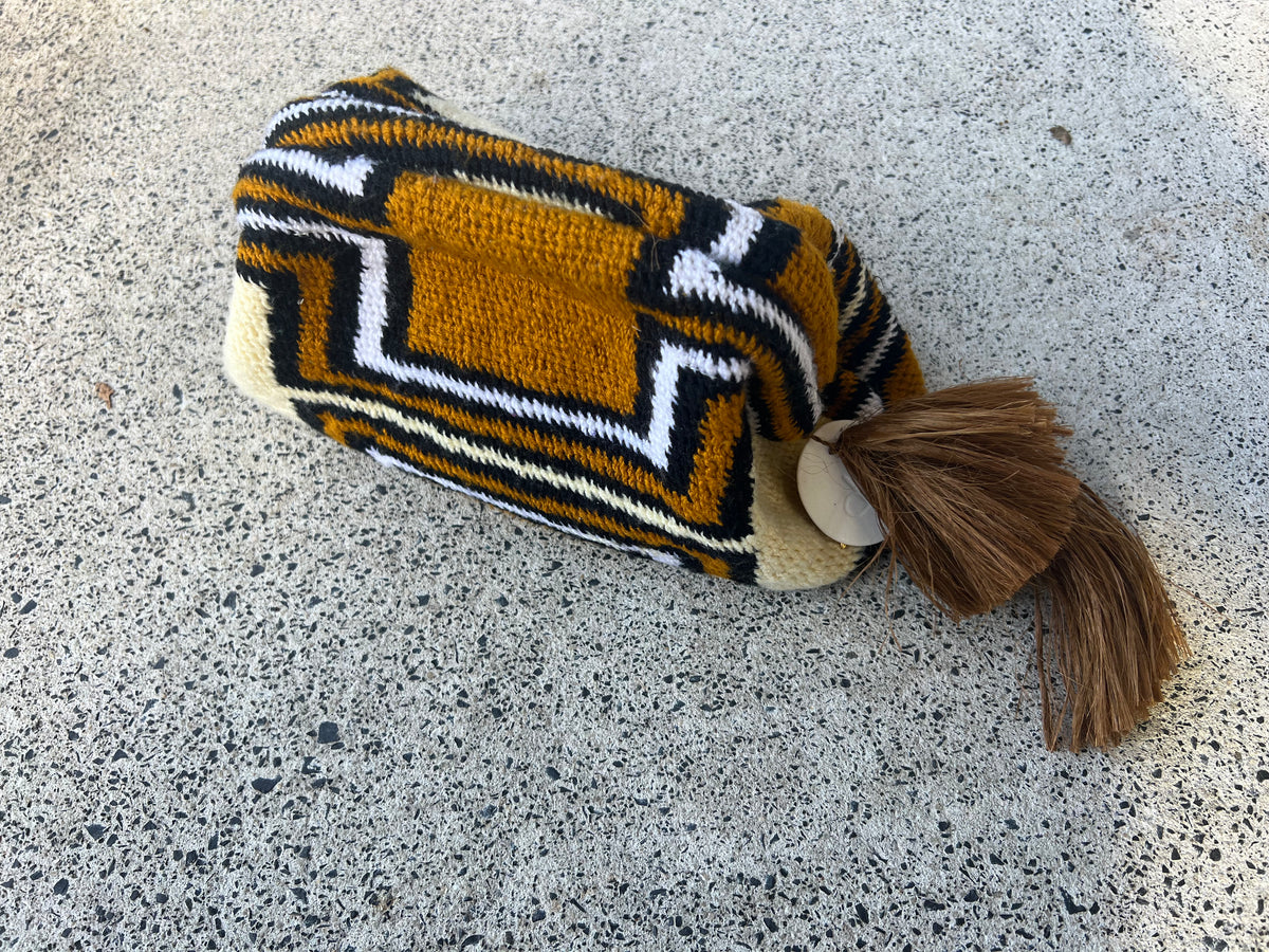 Among Equals Tobacco Clutch